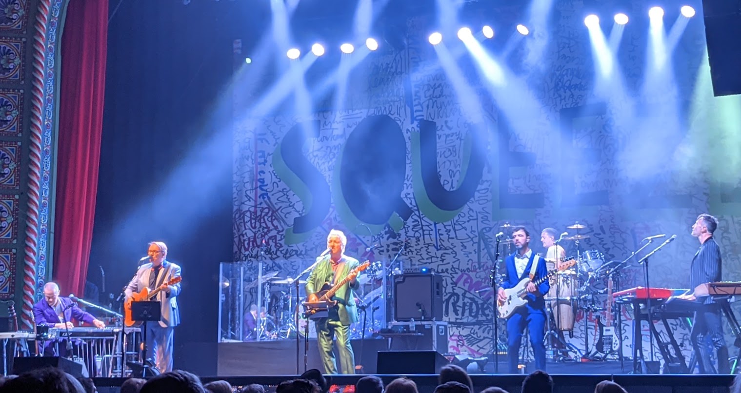 Squeeze performing live on stage